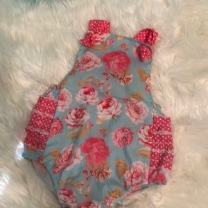 Romper with ruffles on back